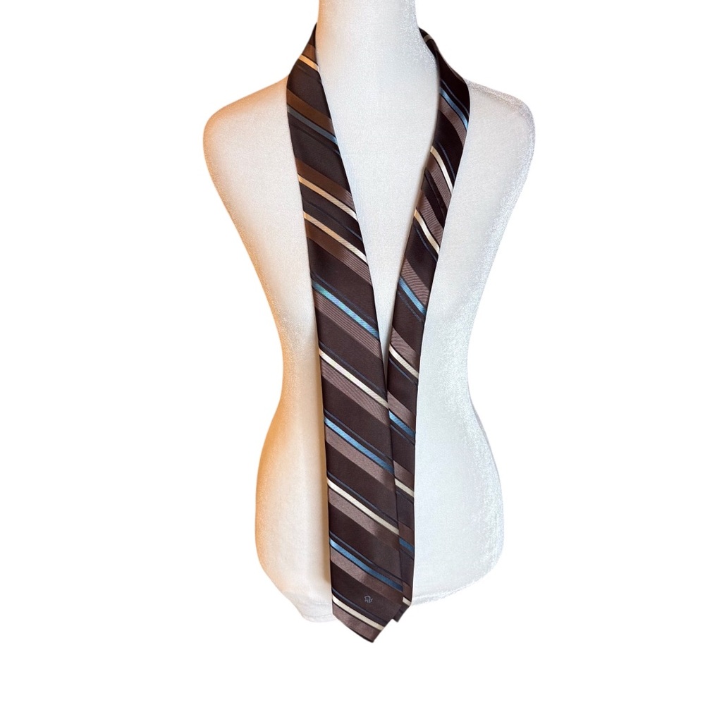 Vintage  Dior® tie features a brown base with tan blue and white stripes.